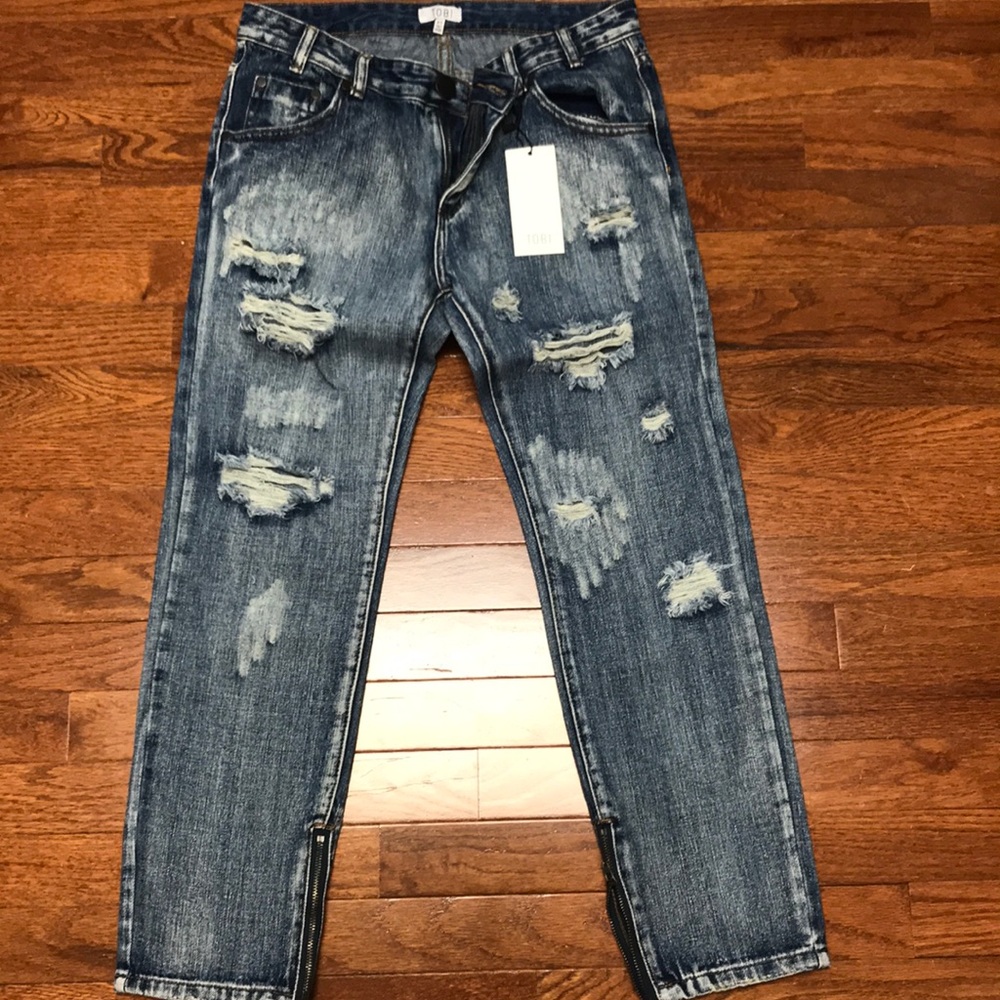 Destroyed denim jeans
